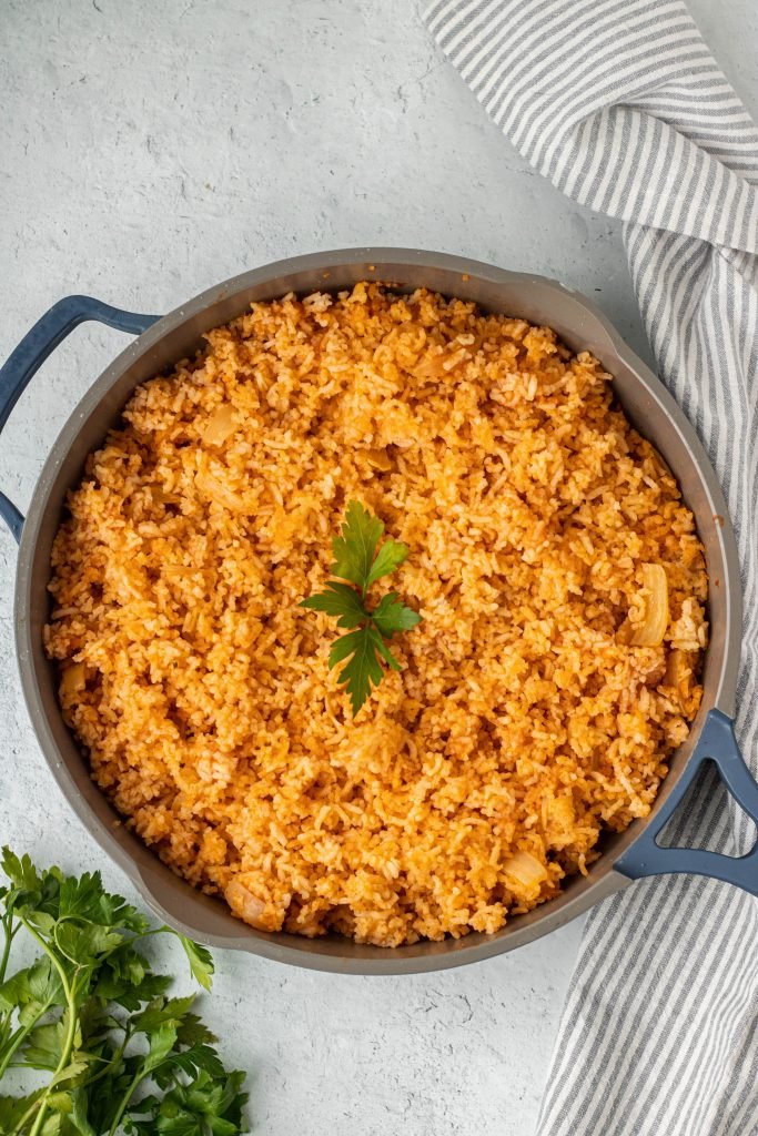 Pan with Authentic Mexican rice, cilantro garnish